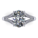 Oval diamond with split diamond shoulders.