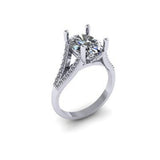 Oval diamond with split diamond shoulders.